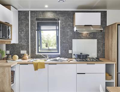 Cuisine du Cottage 4 personnes 2 chambres 2 salles de bain 4 fleurs