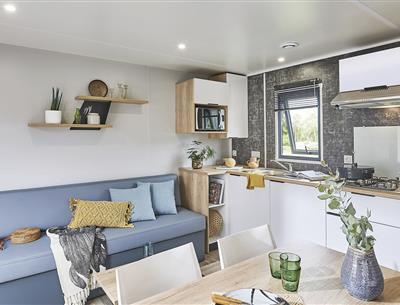 Salon du Cottage 4 personnes 2 chambres 2 salles de bain 4 fleurs